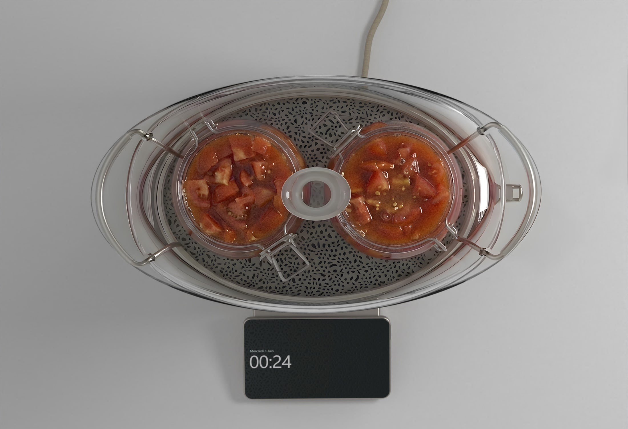 La cocotte en service, deux portions de tomates cuites à la vapeur et la minuterie à 00:24